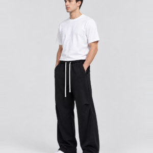 Men's 400 GSM Curved-Seam Flared Sweatpants — model side