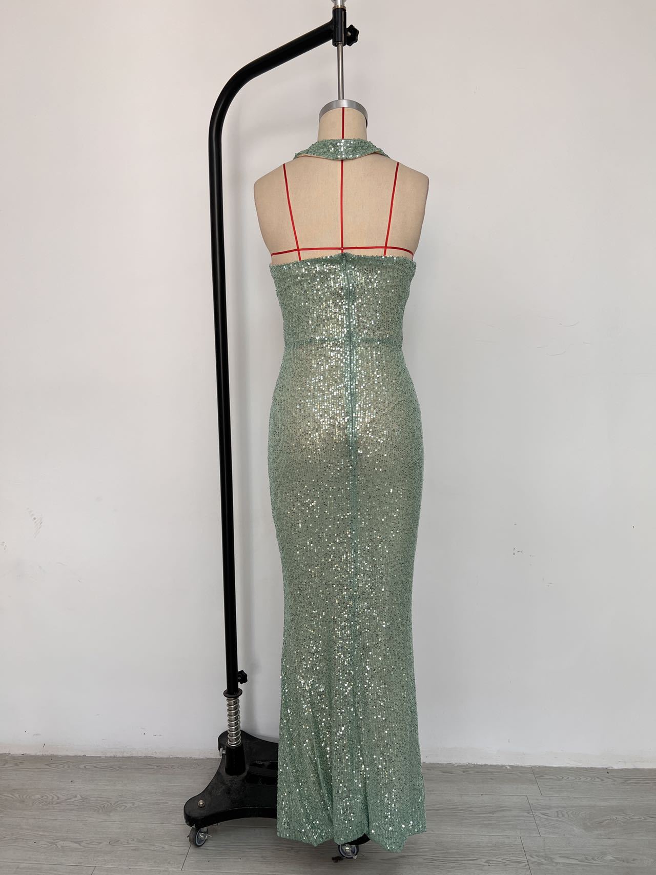 RY495 green sequin gown, supplied dress-form back photo in the original setting