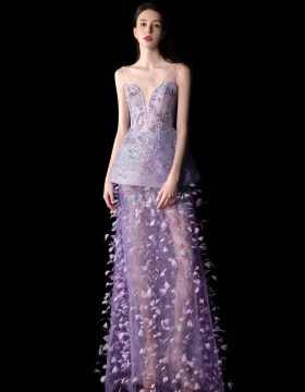 Lilac evening dress with a sparkling fitted bodice and sheer skirt with dimensional feather-like details